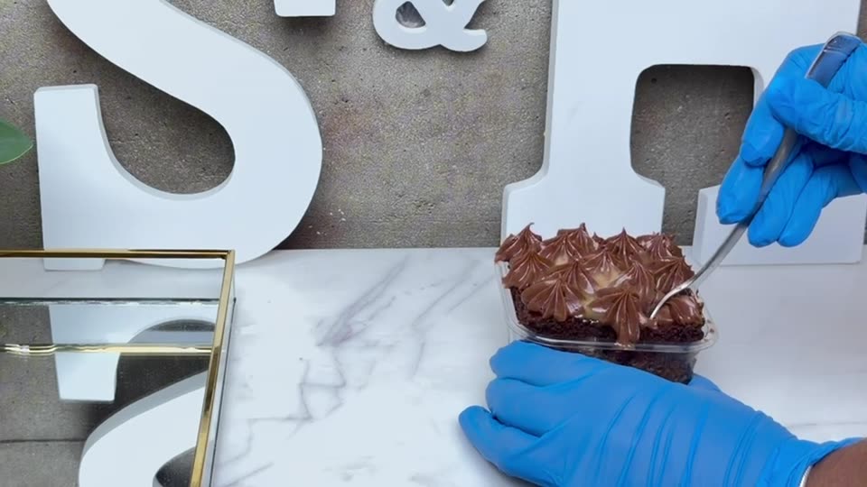 Individually wrapped brownie with a thank you tag