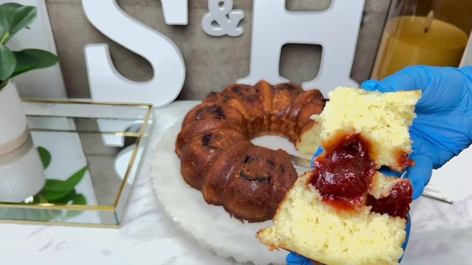 Bundt cake sliced to show the filling
